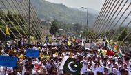 Pakistani Kashmiri students march during an anti-India protest rally in Muzaffarabad, the capital of Pakistan-controlled Kashmir, on August 27, 2019.  AFP / SAJJAD QAYYUM