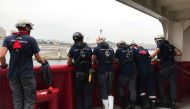 Members of the crew of the Ocean Viking rescue ship, jointly operated by French NGOs SOS Mediterranee and Medecins sans Frontieres (MSF - Doctors Without Borders), arrive in the port of Marseille on August 27, 2019, after 23 days of search-and-rescue oper
