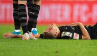 Dortmund's Belgian forward Thorgan Hazard bleeds from he injury sustained during the German first division Bundesliga football match 1 FC Cologne v BVB Borussia Dortmund in Cologne, western Germany on August 23, 2019.  AFP / Marius Becker 