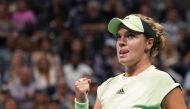 Caty McNally of the US celebrates a point against Serena Williams of the US during their Round Two Women's Singles tennis match of the 2019 US Open at USTA Billie Jean King National Tennis Center in New York on August 28, 2019. / AFP / Don EMMERT