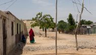 Women sit in the streets of Sanani, Somaliland on June 30, 2019. Thomson Reuters Foundation/Claudio Accheri