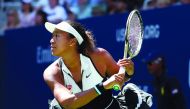 Naomi Osaka of Japan returns a shot during her Women's Singles second round match against Magda Linette of Poland on day four of the 2019 US Open at the USTA Billie Jean King National Tennis Center on August 29, 2019 in Queens borough of New York City. Al