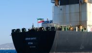 FILE PHOTO:  An Iranian flag flutters on board the Adrian Darya oil tanker, formerly known as Grace 1, off the coast of Gibraltar. AFP / Johnny BUGEJA
