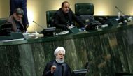 Iran's President Hassan Rouhani (bottom) speaks at parliament in the capital Tehran on September 3, 2019. AFP / ATTA KENARE