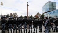 Law enforcement officers stand guard during a rally calling for opposition candidates to be registered for elections to Moscow City Duma, the capital's regional parliament, in Moscow, Russia August 3, 2019. REUTERS/Tatyana Makeyeva