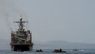 Amphibious Assault Vehicles cruise towards the well deck of the amphibious dock landing ship USS Harpers Ferry (LSD 49), in Gulf of Aden, in this picture released by US Air Force on September 3, 2019. Keypher Strombeck/US Navy/Handout via Reuters