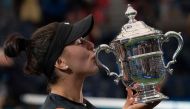 Bianca Andreescu of Canada poses with her trophy after she won against Serena Williams of the US after the Women's Singles Finals match at the 2019 US Open at the USTA Billie Jean King National Tennis Center in New York on September 7, 2019. AFP / Don Emm