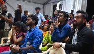 ISRO employees watch the live broadcast of the soft landing of spacecraft Vikram Lander of Chandrayaan-2 on the surface of the Moon at ISRO Telemetry, Tracking and Command Network centre in Bangalore early on September 7, 2019.  AFP / Manjunath Kiran 