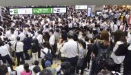 A crowd of passengers is seen as they wait for operations of train services to resume in a snarl caused by Typhoon Faxai at Urawa station in Saitama, north of Tokyo, Japan September 9,, 2019, in this photo taken by Kyodo. Kyodo/via REUTERS 
