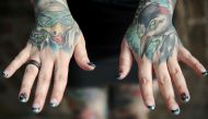 File photo of a tattoo enthusiast poses at the International London Tattoo Convention in London, Britain September 23, 2016. REUTERS/Neil Hall/File Photo