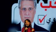 Salwa Karoui, wife of detained Tunisian media mogul and presidential candidate Nabil Karoui, speaks during an election campaign rally in Tunis, Tunisia, September 13, 2019. REUTERS/Zoubeir Souissi