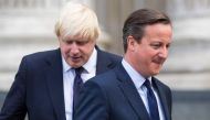 David Cameron and Boris Johnson leave St Paul's Cathedral in central London after attending a memorial service in memory of the 52 victims of the 7/7 London attacks on July 07, 2015. AFP / Jack Taylor 