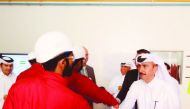 Officials from Qatar Shell meet with sponsored students during a recent visit to CNA-Q.