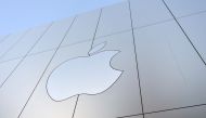 (FILES) In this file photo taken on September 22, 2017 an Apple logo is seen on the outside of an Apple store as new iPhones are released for sale in San Francisco, California. AFP / Josh Edelson