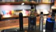 Electronic cigarette devices are pictured on display at a vaping shop in New Delhi on September 18, 2019.  AFP / Prakash SINGH