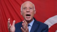 Kais Saied gestures as he speaks during a press conference in Tunis on September 17, 2019, following the announcement of official results in the first round of Tunisia's presidential election. AFP / Anis Mili 