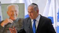 Benjamin Netanyahu delivers a speech during a memorial ceremony for late Israeli president Shimon Peres, at Mount Herzl in Jerusalem, on September 19, 2019. AFP / Gil Cohen-Magen
 