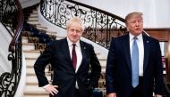 FILE PHOTO: U.S. President Donald Trump and Britain's Prime Minister Boris Johnson arrive for a bilateral meeting during the G7 summit in Biarritz, France, August 25, 2019. Erin Schaff/Pool via REUTERS/File Photo