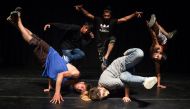 In this photo taken on August 4, 2019, Afghan breakdancers pose for a photograph at the French Cultural Centre in Kabul. AFP / WAKIL KOHSAR 