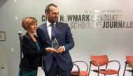 Italian journalist Paolo Borrometi receives the 2019 Peter Mackler Award from Catherine Antoine, Peter Mackler's widow, at the Newmark Graduate School of Journalism in New York on September 25, 2019. AFP / Thomas URBAIN