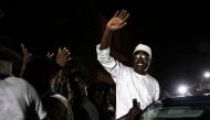 Khalifa Sall, former mayor of Dakar and Senegalese opposition leader, waves at his supporters after being released from prison on September 29, 2019 in Dakar.  / AFP / JOHN WESSELS 