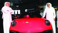 Salman Jassem Al Darwish, Chairman and CEO of Porsche Centre Doha (right); and Porsche Centre Doha Brand Manager, Ahed Dawood, revealed the eighth generation of the Porsche 911 at a special event held by Porsche Centre Doha, Al Boraq Automobiles Co WLL, a