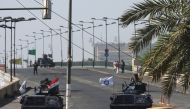 Iraqi security forces cut off Jamhuriya bridge, which leads to Baghdad's administrative and diplomatic Green Zone, in Tahrir Square in central Baghdad on October 5, 2019 after a curfew was lifted following a day of violent protests.  AFP / AHMAD AL-RUBAYE