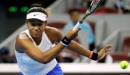 Naomi Osaka of Japan in action against Ashleigh Barty of Australia. REUTERS/Jason Lee
