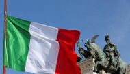 File photo of the Italian flag waves in front of The 