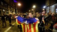 Demonstrators celebrate after police leave the area during a protest, after a verdict in a trial over a banned independence referendum, in Barcelona, Spain, October 20, 2019. REUTERS/Jon Nazca
