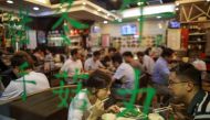 People eat inside a restaurant in Hong Kong, China October 25, 2019. REUTERS