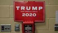 A Trump 2020 campaign poster is seen on a fire alarm during a campaign rally by Donald Trump in Fayetteville, North Carolina, US, September 9, 2019. Reuters / Kevin Lamarque