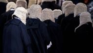 Judges wearing wigs attend a ceremony to mark the beginning of the legal year in Hong Kong, China January 8, 2018. Reuters/Bobby Yip