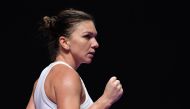 Simona Halep of Romania reacts during her women's singles match against Karolina Pliskova of Czech Republic in the WTA Finals tennis tournament in Shenzhen on November 1, 2019. / AFP / Noel CELIS