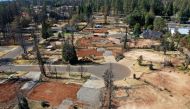  An aerial view of a neighborhood destroyed by the Camp Fire October 21, 2019 in Paradise, California.  Justin Sullivan/Getty Images/AFP