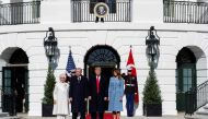 U.S. President Donald Trump and first lady Melania Trump stand with Turkey's Pressident Tayyip Erdogan and Emine Erdogan upon their arrival at the White House in Washington, U.S., November 13, 2019. (REUTERS/Tom Brenner)
