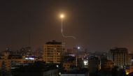 Israeli missile launched from the Iron Dome defence missile system, designed to intercept and destroy incoming short-range rockets and artillery shells, is seen above Gaza city on November 13, 2019. / AFP / MAHMUD HAMS