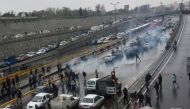People protest against increased gas price, on a highway in Tehran, Iran November 16, 2019. Nazanin Tabatabaee/WANA (West Asia News Agency) via REUTERS