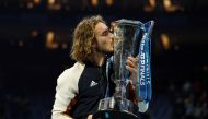 Tennis - ATP Finals - The O2, London, Britain - November 17, 2019 Greece's Stefanos Tsitsipas celebrates winning the ATP Finals with the trophy REUTERS/Peter Nicholls
