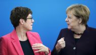 FILE PHOTO: Germany's Defence Minister and CDU Chairwoman Annegret Kramp-Karrenbauer and Chancellor Angela Merkel attend a CDU board meeting in Berlin, Germany, October 14, 2019. REUTERS/Michele Tantussi/File Photo