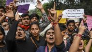 Student shout slogans and hold posters during a demonstration in support of Jawaharlal Nehru University (JNU) students for their ongoing protest against accommodation fee hike, in New Delhi on November 21, 2019. / AFP / Sajjad HUSSAIN