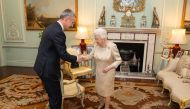 Britain's Queen Elizabeth II (R) hosts NATO Secretary General Jens Stoltenberg during a private audience at Buckingham Palace in central London on December 3, 2019, prior to the NATO alliance summit. AFP pool / Dominic Lipinski
 