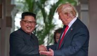 US President Donald Trump meets North Korean leader Kim Jong Un at the Capella Hotel on Sentosa island in Singapore, June 12, 2018. Kevin Lim / The Straits Times via Reuters