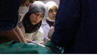 Dr Amani Ballour treats a patient in a scene from the film 