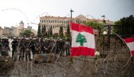 File photo:  Riot police stand guard behind barbed-wire next to the Government Palace during ongoing anti-government protests in downtown Beirut, Lebanon, October 24, 2019. Reuters / Alkis Konstantinidis.jpeg 