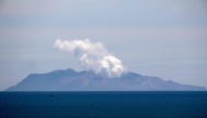 Steam rises from the White Island volcano following the December 9 volcanic eruption, in Whakatane on December 11, 2019. AFP / Marty Melville 