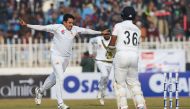 Pakistan's Mohammad Abbas (L) celebrates after bowing out Sri Lanka's Dinesh Chandimal (R) Pakistan's Mohammad Abbas celebrates the dismissal of Sri Lanka's Dinesh Chandimal during the first day of the first Test cricket match between Pakistan and Sri Lan