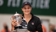 Ashleigh Barty  poses with the trophy after her match against Marketa Vondrousova  on day 14,2019 French Open . Jun 8, 2019 . Paris, France.

