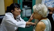 Representative image (Cuban gediatrician Alina Gonzalez, 57, examines an elderly woman at the Longevity Research Center)where she works in Havana on October 11, 2019. AFP / Yamil Lage) 