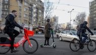 Commuters cross an intersection at Porte de Vanves in Paris on December 18, 2019, during an ongoing transport strike in France. (AFP / AURORE MESENGE)